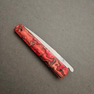 couteau pliant à friction avec manche en acrylique striée rouge